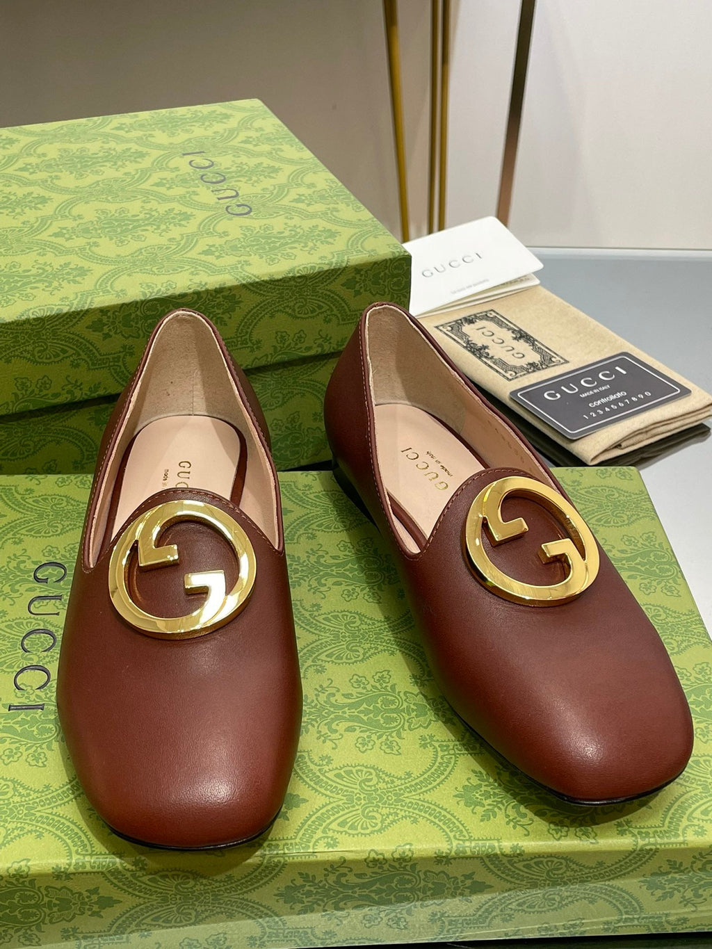 BLONDIE LOGO-PLAQUE LOAFERS IN SYRUP BROWN CALFSKIN