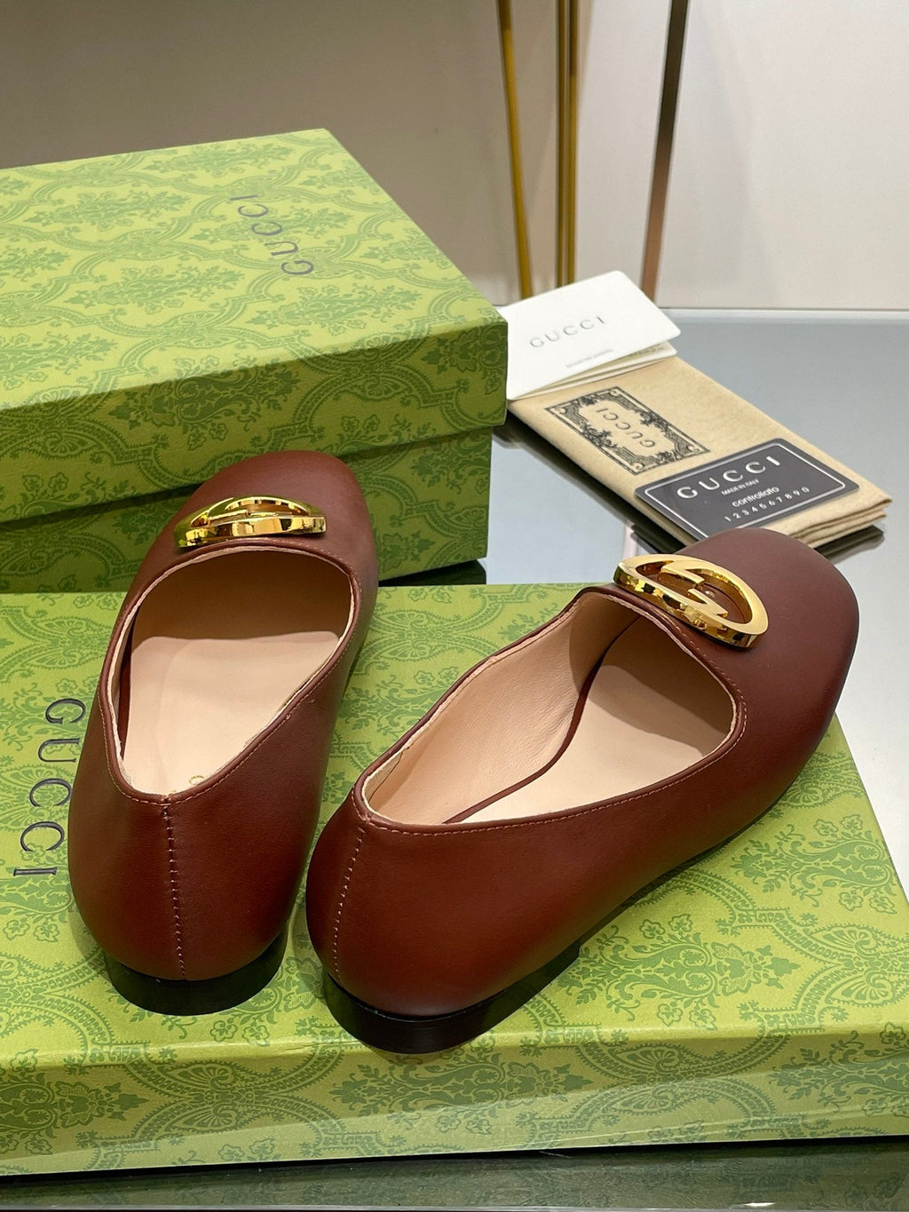 BLONDIE LOGO-PLAQUE LOAFERS IN SYRUP BROWN CALFSKIN