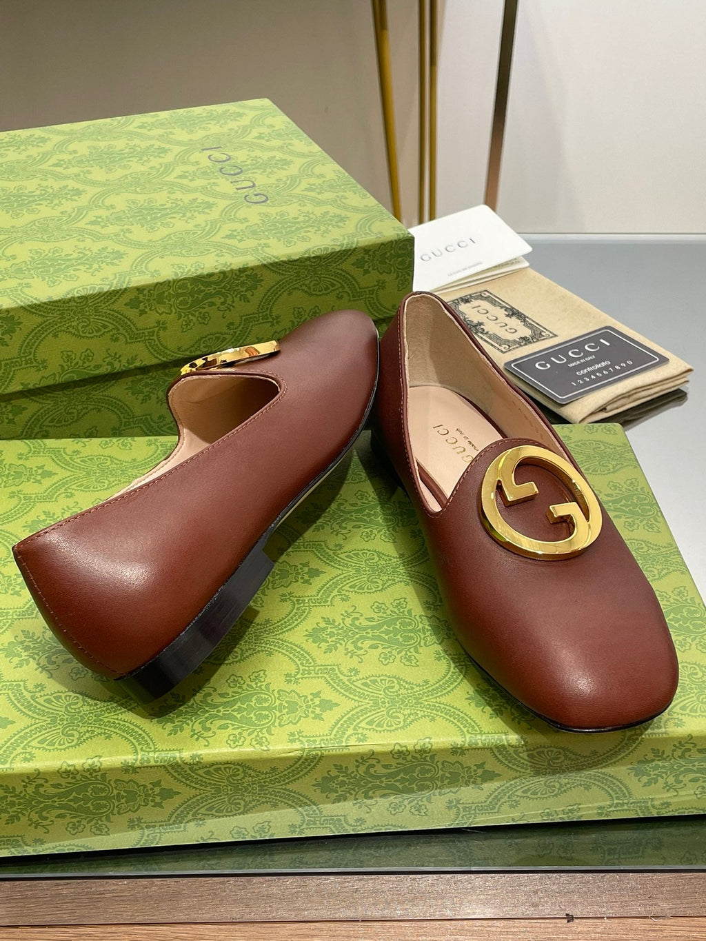 BLONDIE LOGO-PLAQUE LOAFERS IN SYRUP BROWN CALFSKIN