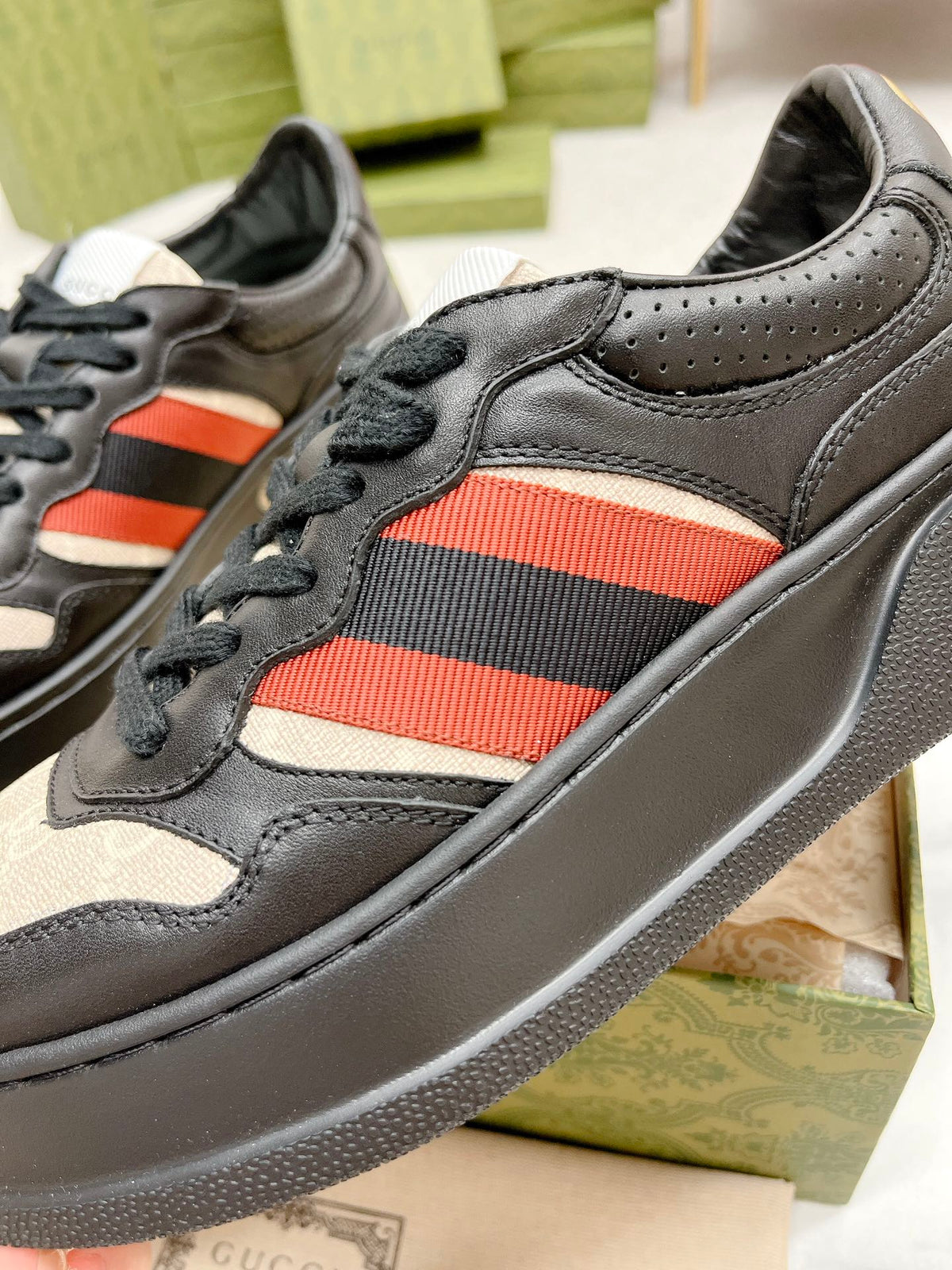 GG TRAINER BLACK AND CREAM CALFSKIN