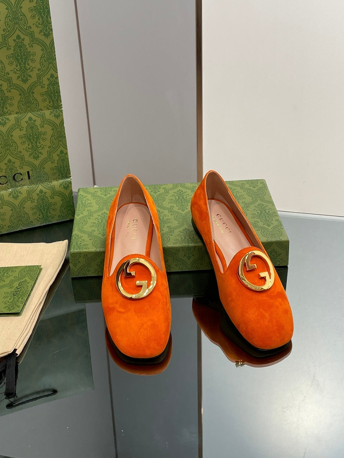 BLONDIE LOGO-PLAQUE LOAFERS IN TIGER ORANGE SUEDE