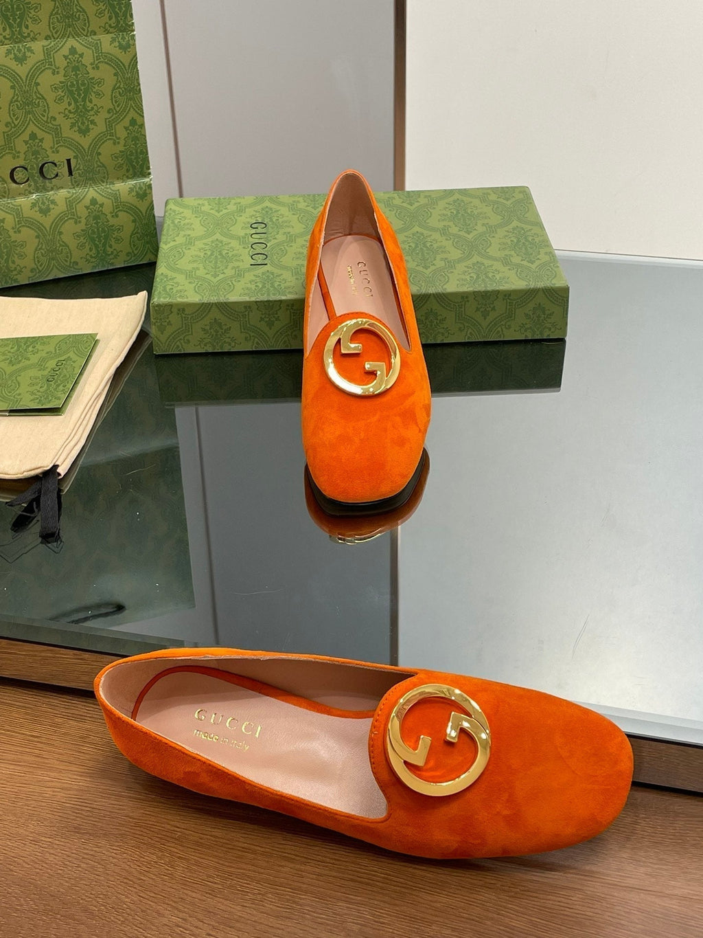 BLONDIE LOGO-PLAQUE LOAFERS IN TIGER ORANGE SUEDE