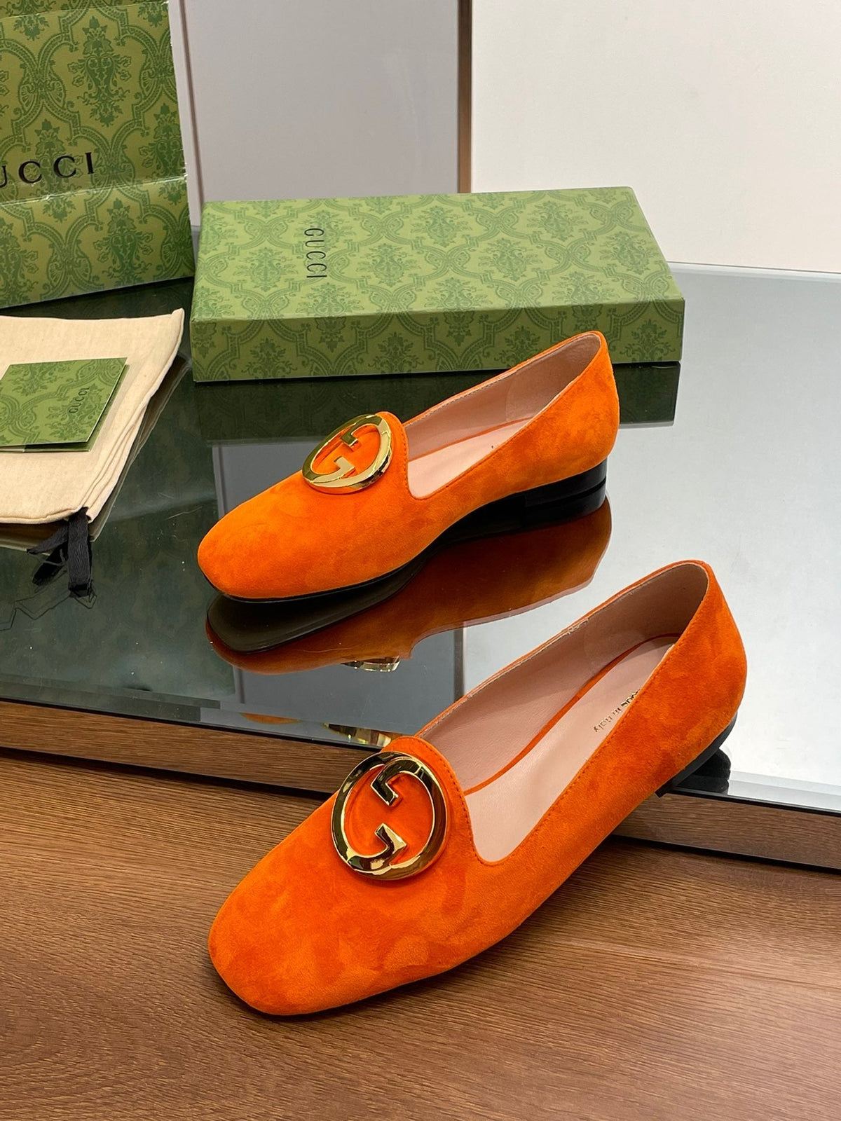 BLONDIE LOGO-PLAQUE LOAFERS IN TIGER ORANGE SUEDE