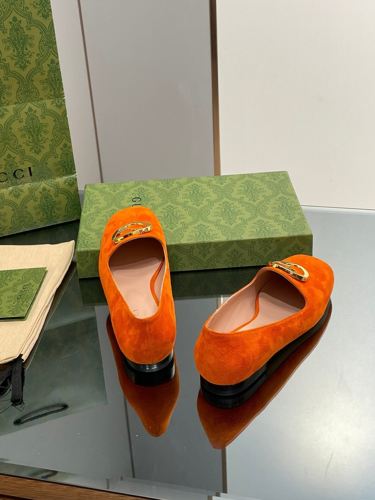 BLONDIE LOGO-PLAQUE LOAFERS IN TIGER ORANGE SUEDE