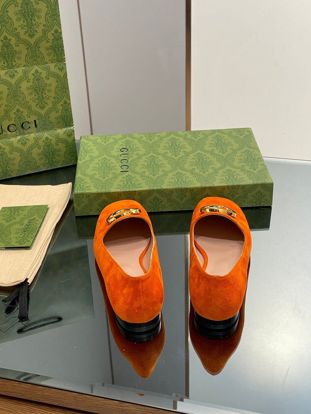 BLONDIE LOGO-PLAQUE LOAFERS IN TIGER ORANGE SUEDE