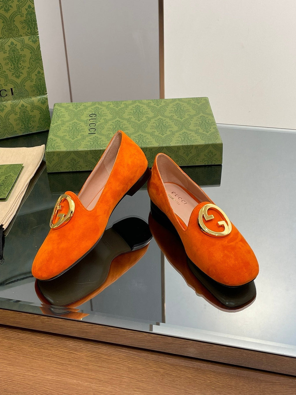 BLONDIE LOGO-PLAQUE LOAFERS IN TIGER ORANGE SUEDE