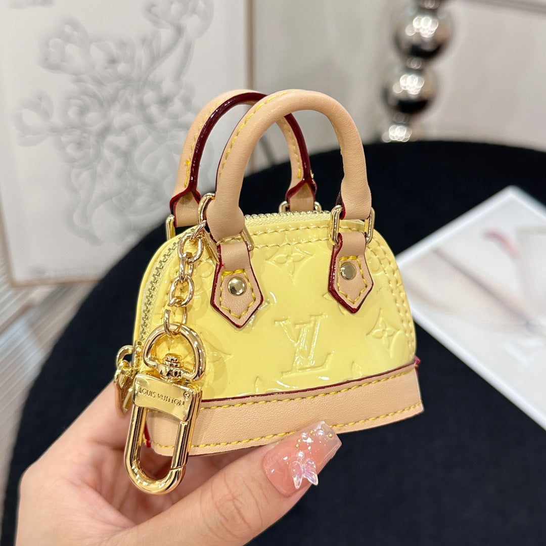 LV Alma Bag Charm Yellow mix Beige Cowhide Canvas