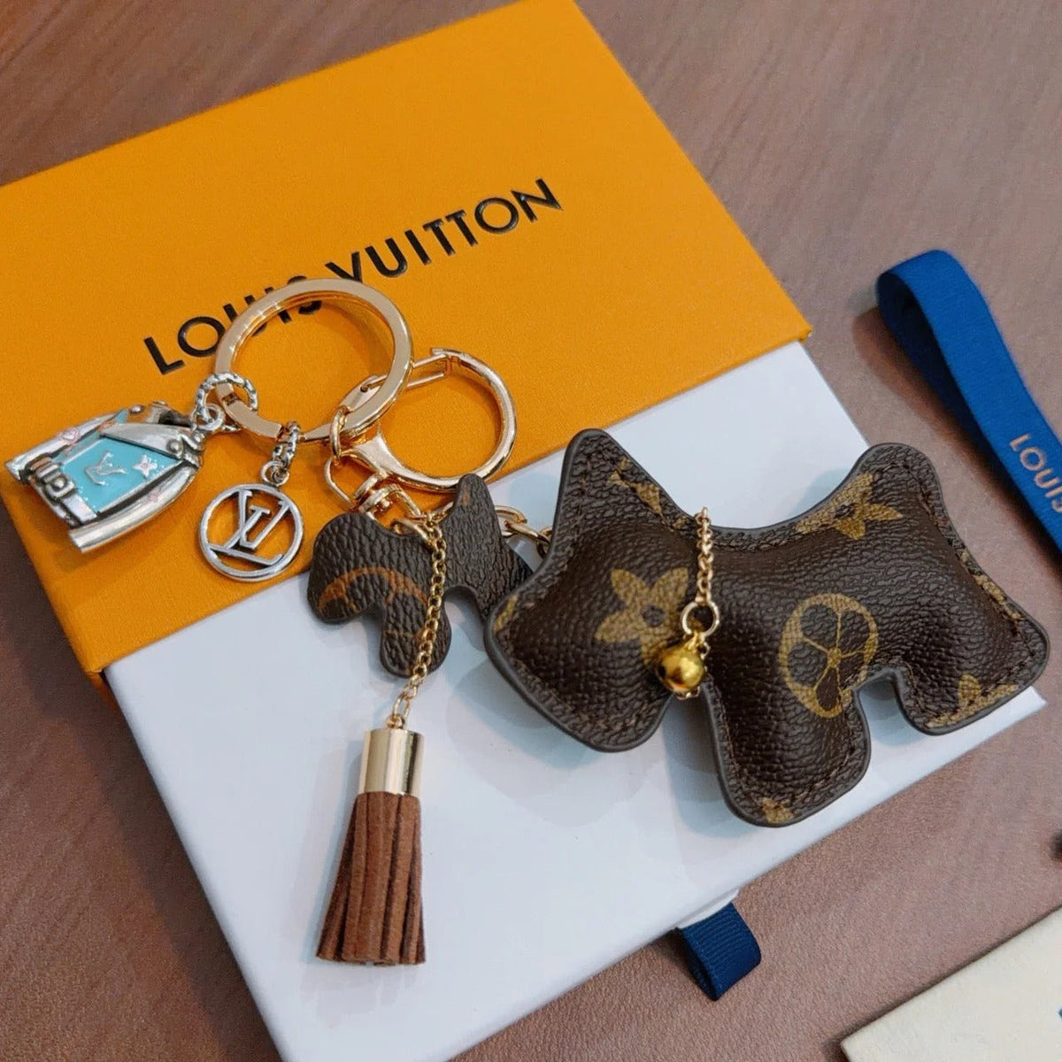 LV Brown Dog Charm With Silver Jacket