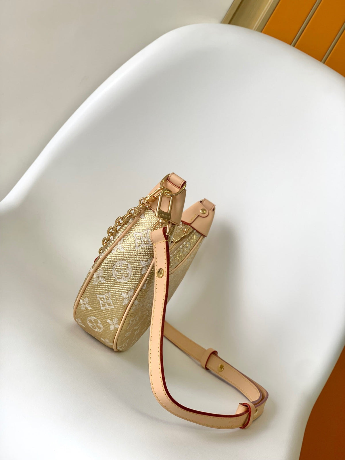 LV Loop Baguette Bag 23cm Gold in Monogram Coated Canvas 286670