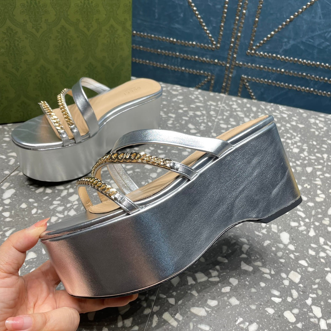HIGH WEDGE PLATFORM IN SILVER CALFSKIN WITH GOLD HARDWARE