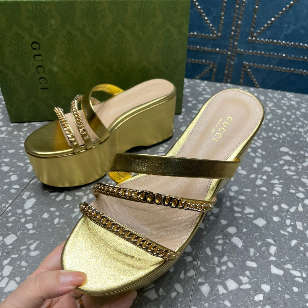 HIGH WEDGE PLATFORM IN GOLD CALFSKIN WITH GOLD HARDWARE