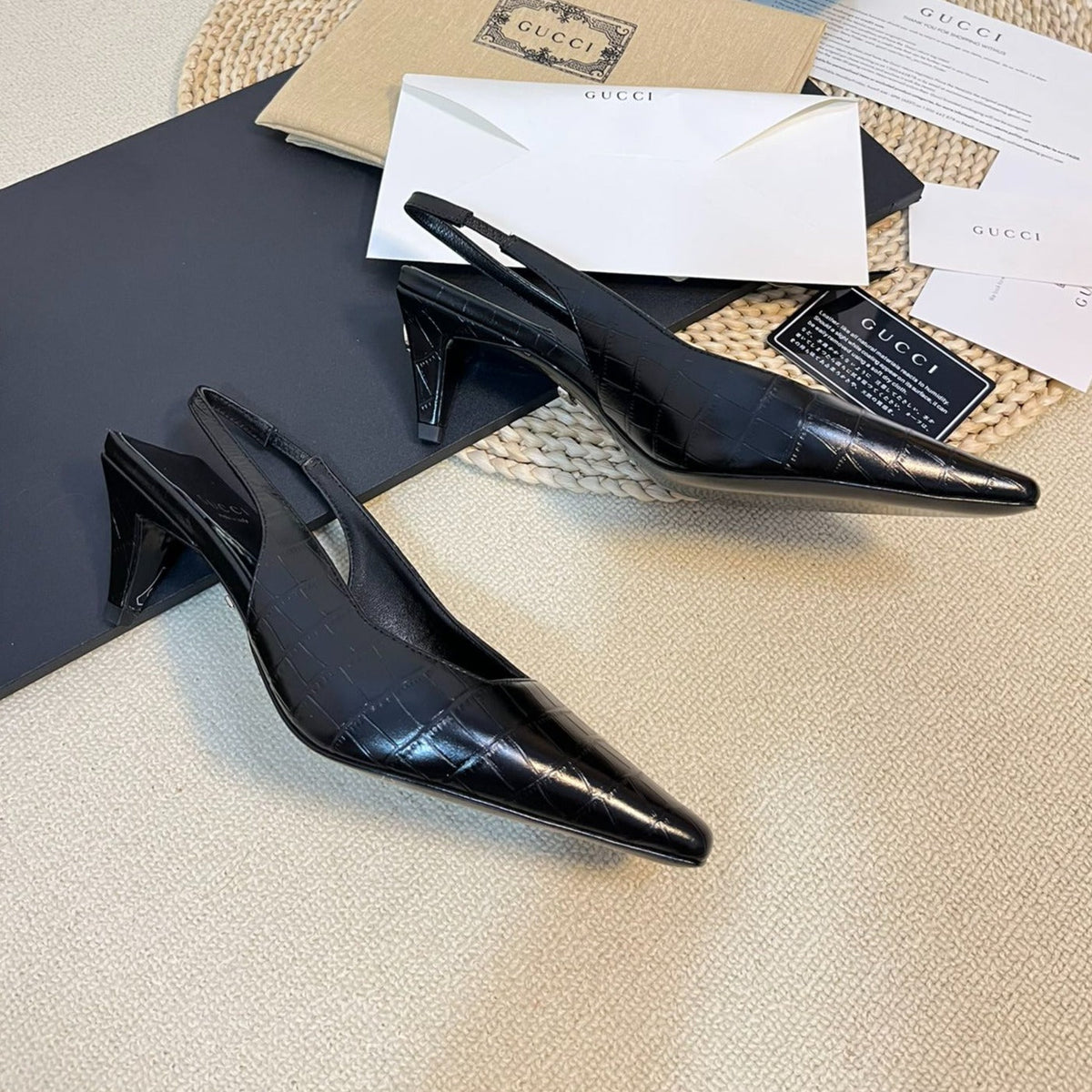 GG Women's G pointed silver-letter Logo slingback Black