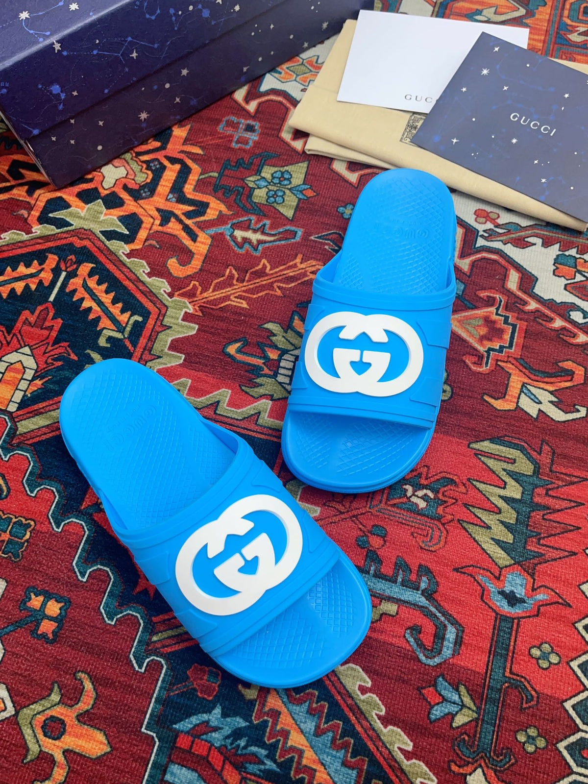 GG INTERLOCKING G SLIDE SANDAL BRIGHT BLUE RUBBER