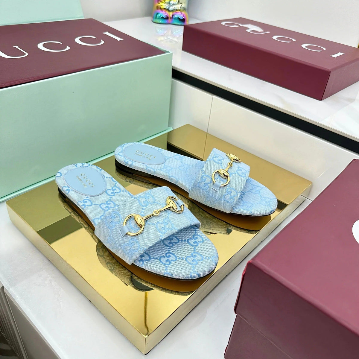 GG SLIDES IN BLUE WITH GOLD HARDWARE